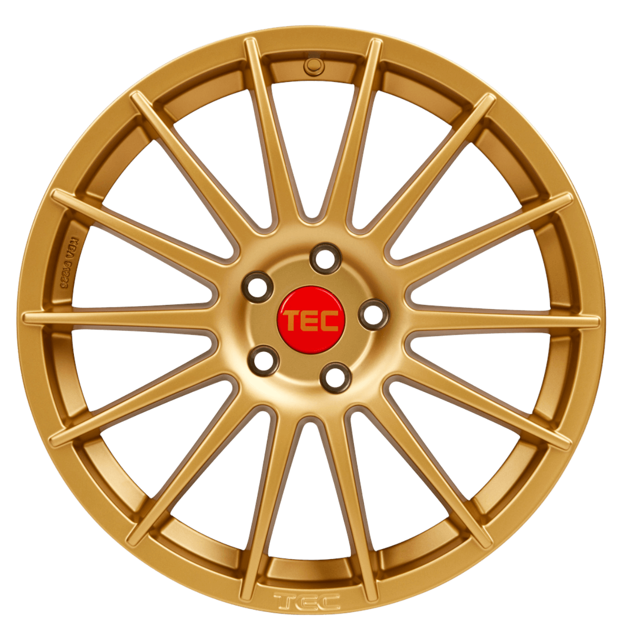 Goldene mehrspeichige Alufelge mit roter TEC-Nabenkappe auf weißem Hintergrund