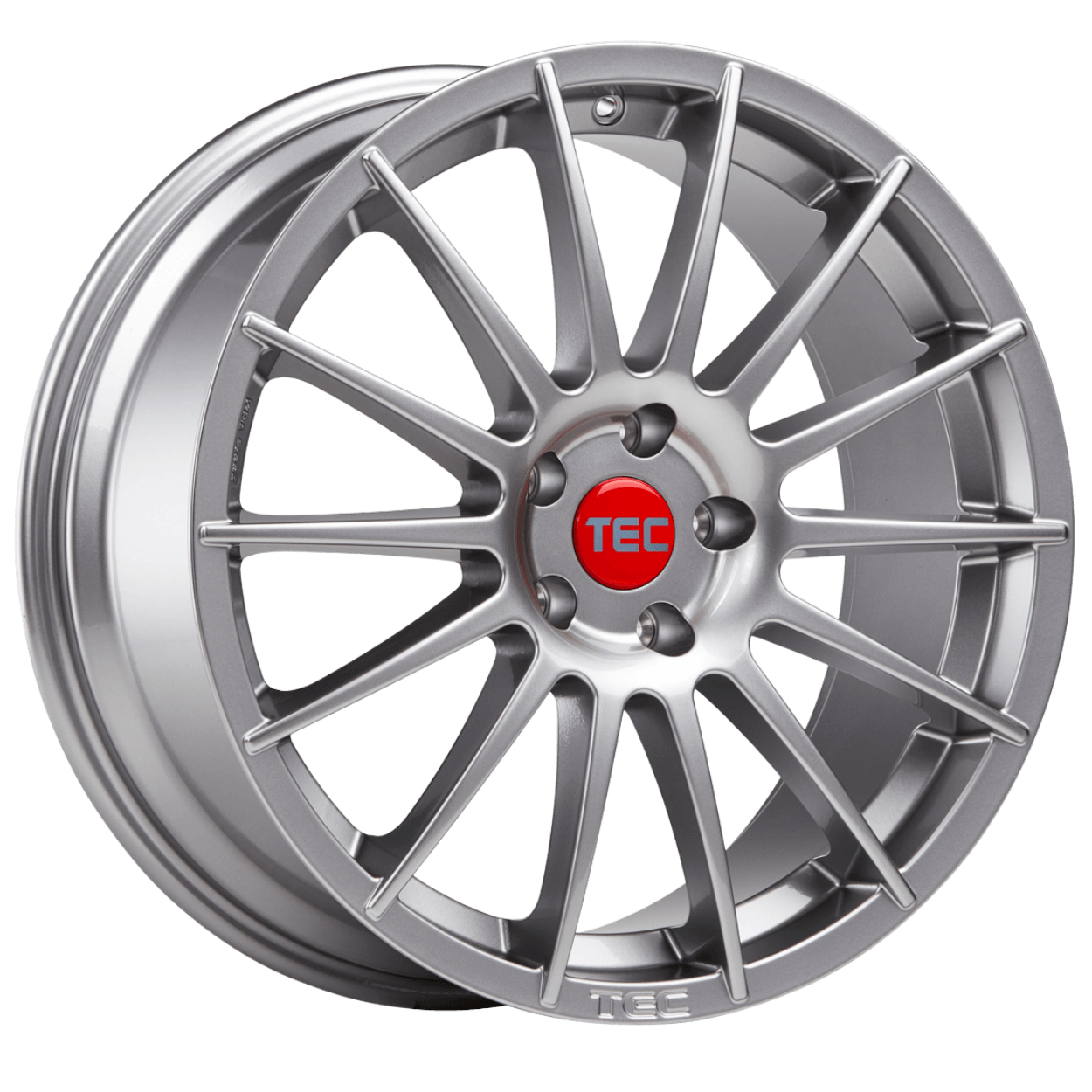 Silberne Alufelge mit mehreren Speichen, roter Nabenkappe mit TEC-Schriftzug auf weißem Hintergrund