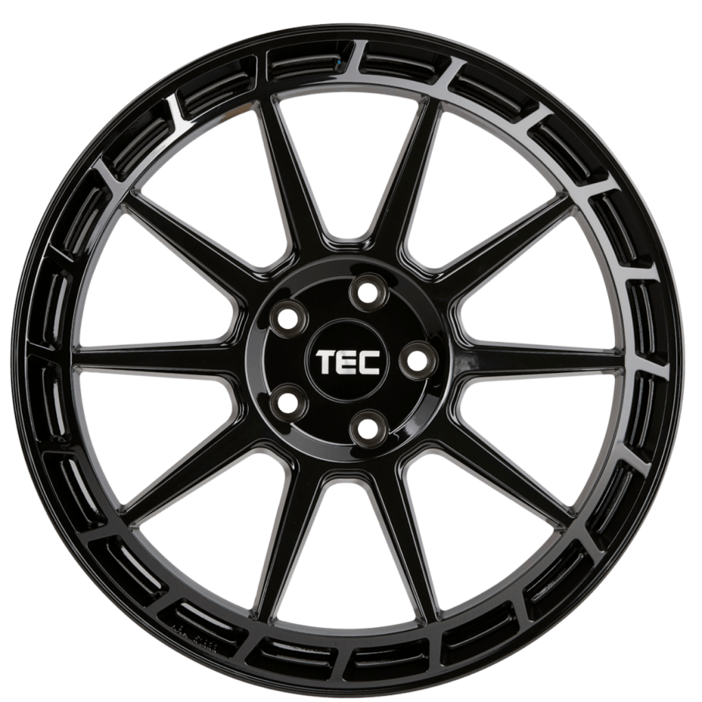 Schwarzes mehrspeichiges TEC-Alufelge mit zentralem Logo aus der Vogelperspektive auf weißem Hintergrund